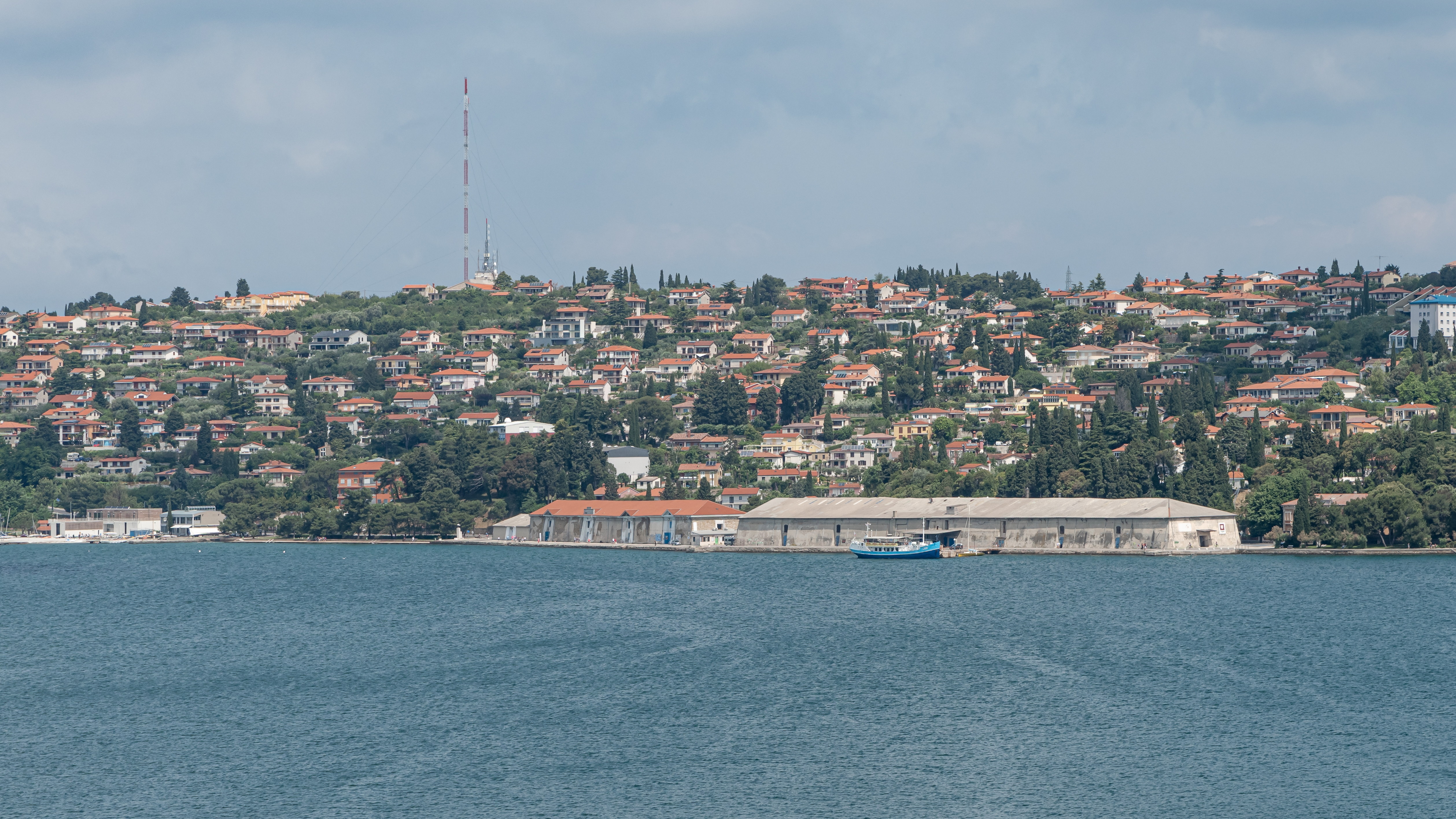 Monfort salt warehouse in Portorož — view of the long stone facade